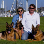 Jeannette and Michael Kempkes with their German Shepherds at the marina