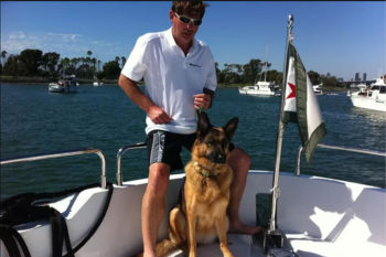 German shepherd on a boat with Michael Kempkes
